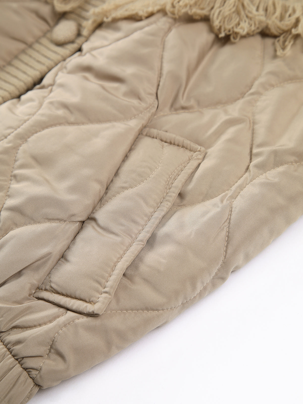 Vérae | Veste matelassée en tricot torsadé patchwork